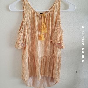 Over the shoulder orange shirt